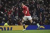 Manchester United's Cristiano Ronaldo celebrates scoring his side's first goal during the English Premier League soccer match between Manchester United and Brighton & Hove Albion at Old Trafford stadium, in Manchester, England, Tuesday, Feb. 15, 2022. (AP Photo/Rui Vieira)