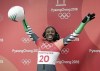 FILE - Simidele Adeagbo of Nigeria reacts in the finish area after the final run of the women's skeleton competition at the 2018 Winter Olympics in Pyeongchang, South Korea, Saturday, Feb. 17, 2018. In 2018, Nigeria fielded Africa's first-ever bobsled team; Adeagbo became the first African and Black woman to compete in skeleton. (AP Photo/Wong Maye-E, File)