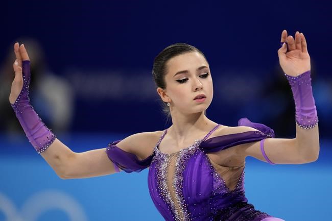 Kamila Valieva, of the Russian Olympic Committee,competes in the women's short program during the figure skating at the 2022 Winter Olympics, Tuesday, Feb. 15, 2022, in Beijing. (AP Photo/Natacha Pisarenko)