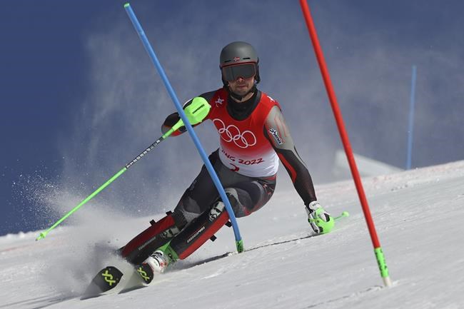 Sebastian Foss-Solevaag, of Norway passes a gate during the second run of the men's slalom at the 2022 Winter Olympics, Wednesday, Feb. 16, 2022, in the Yanqing district of Beijing. (AP Photo/Alessandro Trovati)