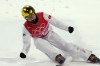 China's Qi Guangpu reacts during the men's aerials finals at the 2022 Winter Olympics, Wednesday, Feb. 16, 2022, in Zhangjiakou, China. (AP Photo/Francisco Seco)