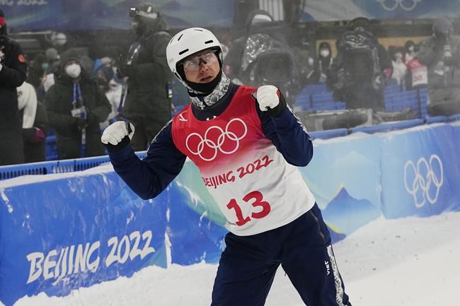 Ukraine's Oleksandr Abramenko reacts during the men's aerials finals at the 2022 Winter Olympics, Wednesday, Feb. 16, 2022, in Zhangjiakou, China. (AP Photo/Gregory Bull)