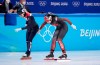 Xandra Velzeboer of the Netherlands (left) edges out Courtney Sarault of Canada at the finish line of the women's 1,500-metre short-track speedskating semifinal at the Beijing Winter Olympics in Beijing, China, on Wednesday, Feb. 16, 2022. THE CANADIAN PRESS/Paul Chiasson