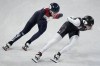 Kristen Santos of the United States, races in her quarterfinal of the women's 1500-meters during the short track speedskating competition at the 2022 Winter Olympics, Wednesday, Feb. 16, 2022, in Beijing. (AP Photo/David J. Phillip)