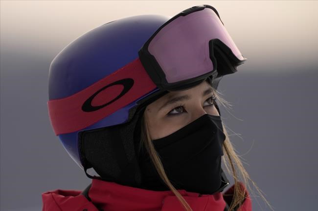 China's Eileen Gu competes during the women's halfpipe qualification at the 2022 Winter Olympics, Thursday, Feb. 17, 2022, in Zhangjiakou, China. (AP Photo/Francisco Seco)
