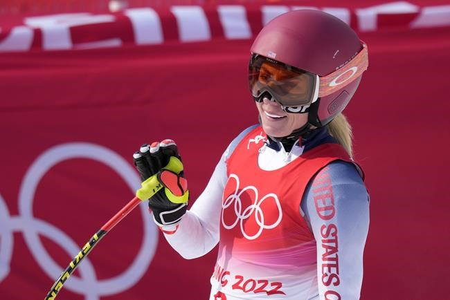 Mikaela Shiffrin of the United States reacts after finishing the women's combined downhill at the 2022 Winter Olympics, Thursday, Feb. 17, 2022, in the Yanqing district of Beijing. (AP Photo/Luca Bruno)