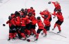 Team Canada celebrates after defeating the United States in women's hockey gold medal game action at the 2022 Winter Olympics in Beijing on Thursday, Feb. 17, 2022. THE CANADIAN PRESS/Paul Chiasson