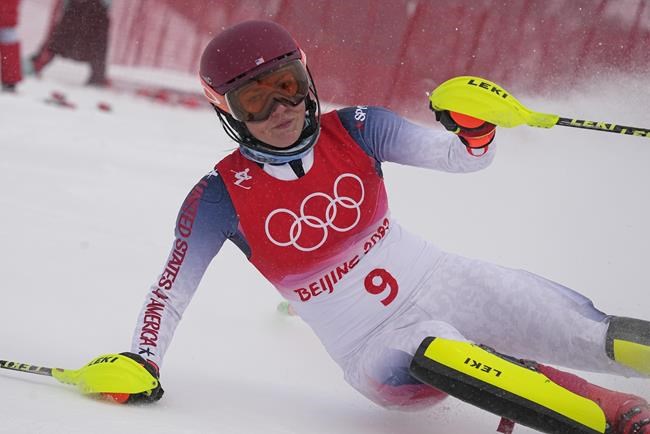 Mikaela Shiffrin of the United States crashes out during the women's combined slalom at the 2022 Winter Olympics, Thursday, Feb. 17, 2022, in the Yanqing district of Beijing. (AP Photo/Robert F. Bukaty)