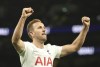 Tottenham's Harry Kane celebrates after scoring his side's third goal during an English FA Cup fourth round soccer match between Tottenham Hotspur and Brighton and Hove Albion at the Tottenham Hotspur Stadium in London, England, Saturday, Feb. 5, 2022. (AP Photo/Ian Walton)