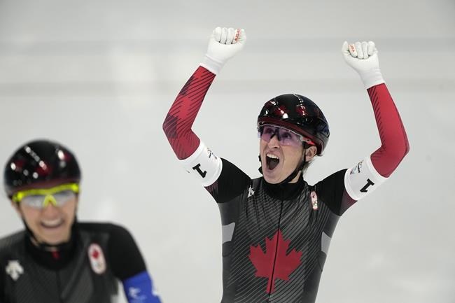 Ivanie Blondin of Team Canada reacts after they won the gold medal and set an Olympic record in the speedskating women's team pursuit finals at the 2022 Winter Olympics, Tuesday, Feb. 15, 2022, in Beijing. THE CANADIAN PRESS/AP/Ashley Landis