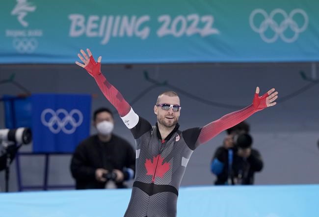 Canada's Laurent Dubreuil reacts after winning the silver medal in the menÕs 1,000 metre speedskating race at the 2022 Winter Olympics in Beijing on Friday, February 18, 2022. THE CANADIAN PRESS/Paul Chiasson