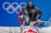 Justin Kripps and Cam Stones, of Canada, start the 2-man heat 1 at the 2022 Winter Olympics, Monday, Feb. 14, 2022, in the Yanqing district of Beijing. THE CANADIAN PRESS/AP-Pavel Golovkin