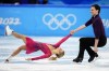 Kirsten Moore-Towers and Michael Marinaro, of Canada, compete in the pairs short program during the figure skating competition at the 2022 Winter Olympics, Friday, Feb. 18, 2022, in Beijing. (AP Photo/Natacha Pisarenko)