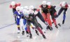 Canada's Ivanie Blondin, centre, competes in the women's mass start speedskating race at the 2022 Winter Olympics in Beijing on Saturday, February 19, 2022. THE CANADIAN PRESS/Paul Chiasson