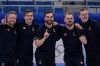 Team Sweden celebrates their win in the men's curling final match between Britain and Sweden at the Beijing Winter Olympics Saturday, Feb. 19, 2022, in Beijing. (AP Photo/Brynn Anderson)