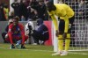 Crystal Palace's Wilfried Zaha, left, reacts after missing a chance to score during the English Premier League soccer match between Crystal Palace and Chelsea at Selhurst Park, London, Saturday, Feb. 19, 2022. (AP Photo/Alberto Pezzali)