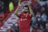 Liverpool's Mohamed Salah applauds the fans after the end of the English Premier League soccer match between Liverpool and Norwich City and at Anfield stadium in Liverpool, England, Saturday, Feb. 19, 2022. Liverpool won the game 3-1.(AP Photo/Rui Vieira)
