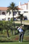 Cameron Young hits his second shot on the first hole during the third round of the Genesis Invitational golf tournament at Riviera Country Club, Saturday, Feb. 19, 2022, in the Pacific Palisades area of Los Angeles. (AP Photo/Ryan Kang)