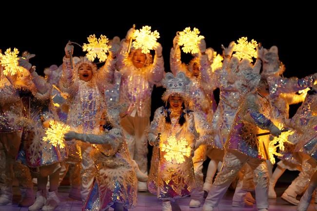Performers participate at the closing ceremony of the 2022 Winter Olympics, Sunday, Feb. 20, 2022, in Beijing. (AP Photo/Bernat Armangue)