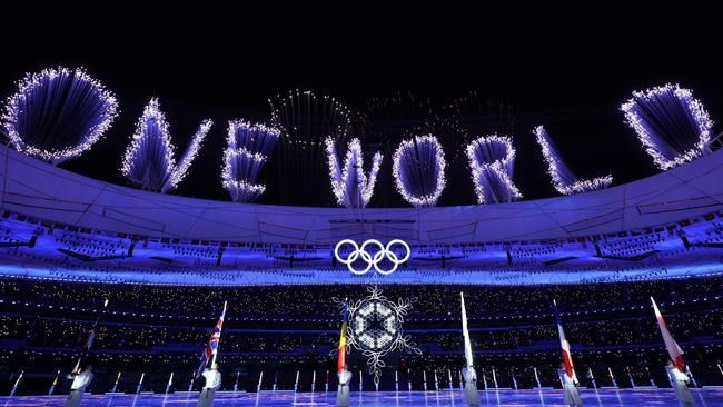 Fireworks explode over the stadium during the closing ceremony of the 2022 Winter Olympics, Sunday, Feb. 20, 2022, in Beijing. (AP Photo/Natacha Pisarenko)
