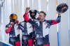 Justin Kripps, Ryan Sommer, Cam Stones and Benjamin Coakwell, of Canada, celebrate after the 4-man heat 4 at the 2022 Winter Olympics, Sunday, Feb. 20, 2022, in the Yanqing district of Beijing. THE CANADIAN PRESS/AP-Pavel Golovkin