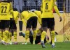 Dortmund's Giovanni Reyna lies on the pitch during the Bundesliga soccer match between Borussia Dortmund and Borussia Moenchengladbach, in Dortmund, Germany, Sunday, Feb. 20, 2022. Gio Reyna’s first start for Borussia Dortmund in six months has ended in tears as the American midfielder suffered what looked like a recurrence of the injury that kept him out. Reyna had to go off in the 30th minute of what would be Dortmund’s 6-0 rout of Borussia Moenchengladbach, covering his face to hide his disappointment after the latest setback. (Bernd Thissen/dpa via AP)