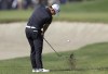 Danny Lee, of New Zealand, hits his second shot on the second hole during the final round of the Genesis Invitational golf tournament at Riviera Country Club, Sunday, Feb. 20, 2022, in the Pacific Palisades area of Los Angeles. (AP Photo/Ryan Kang)