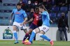Cagliari's Joao Pedro and Napoli's Amir Rrahmani, right, battle for the ball during the Serie A soccer match between Cagliari Calcio and SSC Napoli at Unipol Domus stadium in Cagliari, Italy, Monday Feb. 21, 2022. (Alessandro Tocco/LaPresse via AP)