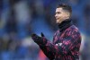 Manchester United's Cristiano Ronaldo applauds during warm up before the English Premier League soccer match between Leeds United and Manchester United, at Elland Road Stadium in Leeds, England, Sunday, Feb. 20, 2022. (AP Photo/Jon Super)