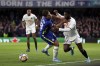 Chelsea's Cesar Azpilicueta tries to stop Lille's Jonathan Bamba, right, during the Champions League round of 16, first leg, soccer match between Chelsea and LOSC Lille at Stamford Bridge stadium in London, Tuesday, Feb. 22, 2022. (AP Photo/Ian Walton)