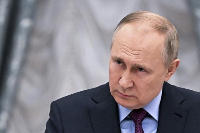 Russian President Vladimir Putin speaks during a joint news conference with Azerbaijani President Ilham Aliyev following their talks in the Kremlin in Moscow, Russia, Tuesday, Feb. 22, 2022. (Mikhail Klimentyev, Sputnik, Kremlin Pool Photo via AP)