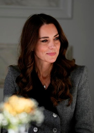 Kate, Duchess of Cambridge, listens during a round table discussion during a visit to the Danner Crisis Center in Copenhagen, Denmark Wednesday, Feb. 23, 2022. The shelter, supported by the Mary Foundation, helps women and children who have been exposed to domestic violence. (AP Photo/Alastair Grant, Pool)