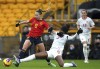 Spain's Athenea Del Castillo Beivide, left, and Canada's Kadeisha Buchanan battle for the ball during the Arnold Clark Cup match at Molineux Stadium, Wolverhampton, England, Wednesday Feb. 23, 2022. (Nick Potts/PA via AP)