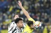 Villarreal's Alfonso Pedraza, right, heads the ball past Juventus' Weston McKennie during the Champions League, round of 16, first leg soccer match between Villarreal and Juventus at the Ceramica stadium in Villarreal, in Villarreal, Spain, Tuesday, Feb. 22, 2022. (AP Photo/Alberto Saiz)