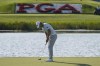 FILE - Matt Jones putts on the 17th hole during the final round of the Honda Classic golf tournament, Sunday, March 21, 2021, in Palm Beach Gardens, Fla. There are two keys to success at PGA National, both of which Matt Jones utilized to perfection in last year’s Honda Classic. The first: make a lot of birdies. The second: don’t try to make a lot of birdies. That’s not as contradictory a plan as it seems. (AP Photo/Marta Lavandier, File)