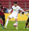 File--- File photo shows Augsburg's Ricardo Pepi fighting for the ball during the German Bundesliga soccer match between Bayer Leverkusen and FC Augsburg, at the Leverkusen BayArena, Germany, Saturday, Jan. 22, 2022. (Marius Becker/dpa via AP,file)