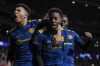 Manchester United's Anthony Elanga, center, celebrates after scoring his side's first goal during the Champions League, round of 16, first leg soccer match between Atletico Madrid and Manchester United at the Wanda Metropolitano stadium in Madrid, Spain, Wednesday, Feb. 23, 2022. (AP Photo/Manu Fernandez)