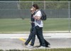 Major League Baseball Players Association chief negotiator Bruce Meyer, left, and New York Yankees pitcher Gerrit Cole talk on their way to contract negotiations at Roger Dean Stadium in Jupiter, Fla., Wednesday, Feb. 23, 2022. (Greg Lovett/The Palm Beach Post via AP)