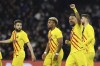 Barcelona's Pierre-Emerick Aubameyang, right, celebrates after scoring a goal during the Europa League soccer match between Napoli and Barcelona at the Diego Armando Maradona stadium, in Naples, Italy, Thursday, Feb. 24, 2022. (Alessandro Garofalo/LaPresse via AP)