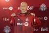 Toronto FC new head coach Bob Bradley poses for a photograph after speaking to the media during the seasons year end press conference Toronto, Wednesday, Nov. 24, 2021. THE CANADIAN PRESS/Nathan Denette