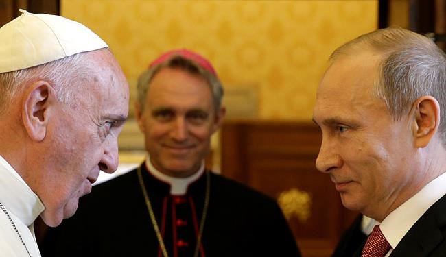 FILE - Pope Francis meets Russian President Vladimir Putin on the occasion of their private audience at the Vatican on June 10, 2015. Pope Francis went to the Russian Embassy on Friday, Feb. 25, 2022 to personally “express his concern about the war,” the Vatican said, in an extraordinary, hands-on papal gesture that has no recent precedent. Usually, popes receive ambassadors and heads of state in the Vatican, and diplomatic protocol would have called for the Vatican foreign minister to summon the ambassador. (AP Photo/Gregorio Borgia, Pool)