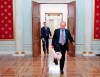 FILE - Russian President Vladimir Putin, foreground, plays with an official match ball for the 2017 FIFA Confederations Cup received from FIFA President Gianni Infantino, after their meeting in the Kremlin in Moscow, Russia, Friday, Nov. 25, 2016. Russian teams have been suspended from all international soccer, including qualifying matches for the 2022 World Cup, as Moscow was pushed toward pariah status in sports for its invasion of Ukraine. World soccer body FIFA and European authority UEFA banned Russian national and club teams from their competitions 