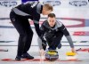 Team Wild Card One skip Brad Gushue, right, makes a shot as lead Geoff Walker sweeps while they play Team Quebec at the Tim Hortons Brier in Lethbridge, Alta., Saturday, March 5, 2022. THE CANADIAN PRESS/Jeff McIntosh