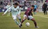 Atlanta United'sAlan Franco, left, vies for control of the ball with Colorado Rapids' Jonathan Lewis during the first half of an MLS soccer match Saturday, March 5, 2022, in Commerce City, Colo. (AP Photo/David Zalubowski)