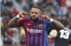 Barcelona's Memphis Depay celebrates after scoring his side's second goal from a penalty kick during a Spanish La Liga soccer match between Elche and Barcelona at the Martinez Valero stadium in Elche, Spain, Sunday, March 6, 2022. (AP Photo/Alberto Saiz)