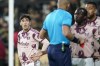 Portland Timbers defender Claudio Bravo, left, reacts after he was given a red card during the second half of an MLS soccer match against the Los Angeles FC in Los Angeles, Sunday, March 6, 2022. (AP Photo/Ashley Landis)