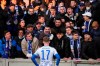 Angry fans speak with Hertha's Maximilian Mittelstaedt after the German Bundesliga soccer match between Hertha Berlin and Eintracht Frankfurt at the Olympiastadion in Berlin, Saturday, March 5, 2022. (Soeren Stache/dpa via AP)