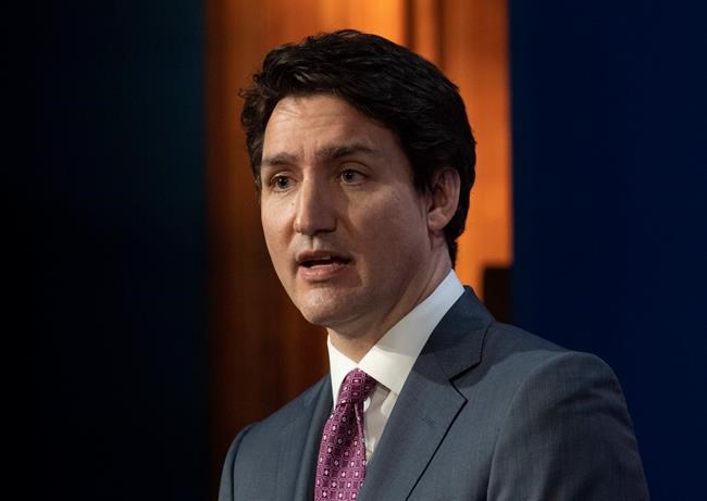 Canadian Prime Minister Justin Trudeau responds to a question during a joint media availability with British Prime Minister Boris Johnson and Prime Minister of the Netherlands Mark Rutte on Downing St., Monday, March 7, 2022 in London. THE CANADIAN PRESS/Adrian Wyld