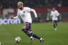 PSG's Neymar runs with the ball during the French League One soccer match between Nice and Paris Saint-Germain in Nice, France, Saturday, March 5, 2022. (AP Photo/Jean-Francois Badias)
