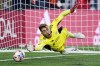 FILE - New England Revolution goalkeeper Matt Turner dives for but can't make the save on a penalty kick, after regulation and extra time, in an MLS playoff soccer match against New York City FC, Tuesday, Nov. 30, 2021, in Foxborough, Mass. New England's Matt Turner will likely be sidelined for a couple more weeks by an ankle injury, raising the possibility the United States will be without its top two goalkeepers when World Cup qualifying resumes on March 24 at Mexico. Revolution coach Bruce Arena said during a news conference on Tuesday, March 8, 2022. that Turner was injured during a practice game at Los Angeles FC. (AP Photo/Charles Krupa, File)
